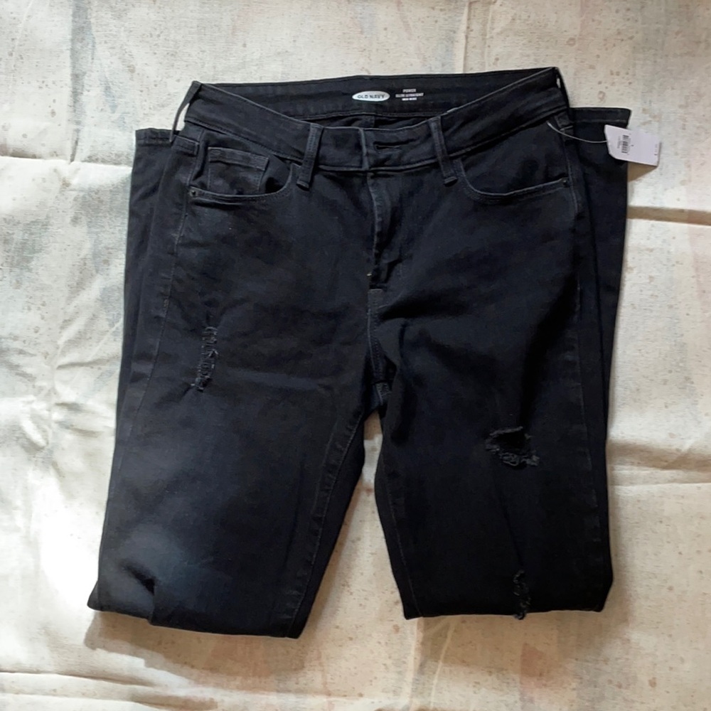 Black power slim straight jeans with distressing